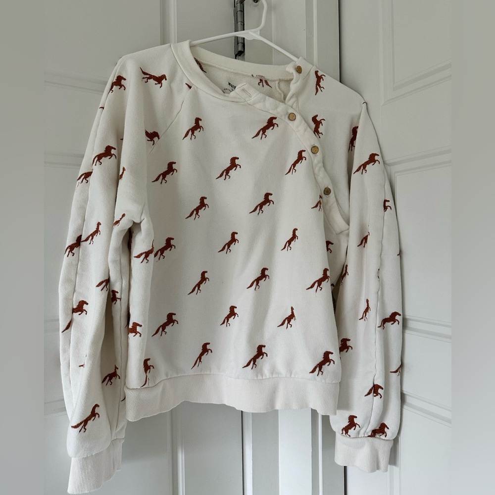 Maeve sweatshirt purchased at Anthropologie.
